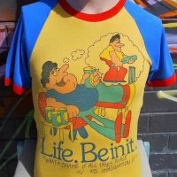 c1970s men's LIFE BE IN IT T-Shirt - What a shame it all takes place in His Imagination - Yellow, Blue & Red colours, smallmedium size - Sold for $50 - 2018