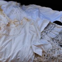 3 x C1910 white cotton ladies garments including long skirt with pierced cutwork, lace panels and two fine cotton white nighties with embroidery and l - Sold for $43 - 2018