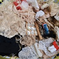 Tub of Vintage lace, trimmings, beaded work MOP buttons etc - Sold for $199 - 2018