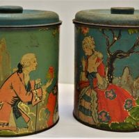 Pair of vintage art deco lidded tin kitchen canisters - 'courting scene' - Sold for $37 - 2018