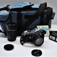 Vintage 35 mm SLR camera Pentax ME with 117 50mm lens and Pentax 135mm 135 lens in bag with flash and accessories - Sold for $68 - 2018