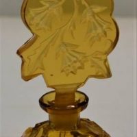 Vintage amber glass perfume bottle with etched thistle decoration to stopper - Sold for $50 - 2018
