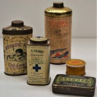 Approx 5 x vintage medicinal packaging items - Bickford's Golden Eye Ointment white glass jar with paper label, Laxettes (Melbourne) tin, Caldwell Bor - Sold for $50 - 2018