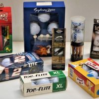 Box of boxed Golf balls including Snoopy Tee Time, Ping, Sydney 2000, Buick etc - Sold for $37 - 2018