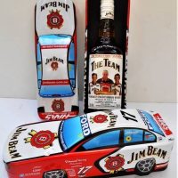 2 x Jim Beam advertising figural tins with Unopenedsealed 700ml bottles - Sold for $273 - 2018