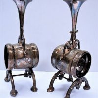 Pair of c1900 Silverplated figural napkin rings by Reed and Barton with mounted trumpets - Sold for $75 - 2018