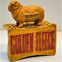 Reproduction 'Golden Fleece' cast iron figural money bank - Sold for $31 - 2018