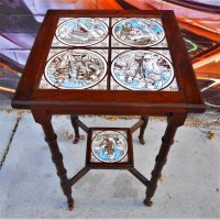 Victorian side table with turned legs on castors and Minton tiled top with Arthurian scene - Sold for $99 - 2018