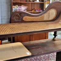Circa 1880 - 1900 Australian cedar and rattan Chaise Lounge with carved detailing to backrest and turned legs , - Sold for $99 - 2018