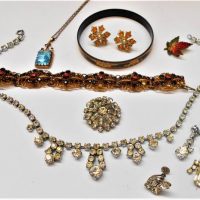 Small box lot vintage costume jewellery incl 1930s Red stone gilt filigree bracelet, blue stone pendant,  Diamante necklaces, earrings, brooch, black  - Sold for $50 - 2018