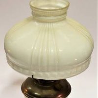 Antique Aladdin oil lamp with original milk glass shade in nickel - Sold for $50 - 2018