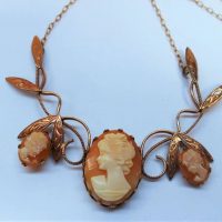 Rose gold plated Cameo necklace featuring three cameos on chain - Sold for $87 - 2018