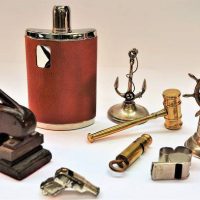 Small group lot blokey items incl letter embossing press, whistles, nautical lighter, brass gavel, etc - Sold for $50 - 2018