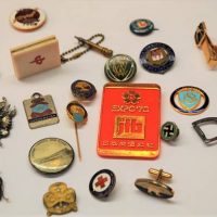 Tin of assorted enamel  badges and mixed items including School, red cross, church etc - Sold for $124 - 2018