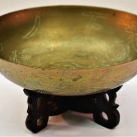 Vintage oriental brass bowl with Characters to the bowl on stand - Sold for $68 - 2018
