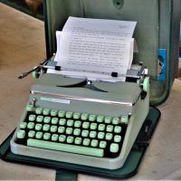 1950s Hermes 2000 typewriter in teal green with original case - Sold for $87 - 2018