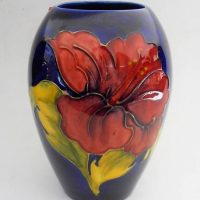 1960s English china, Moorcroft Hibiscus vase - blue ground, signed to base, approx 14cm - Sold for $149 - 2019