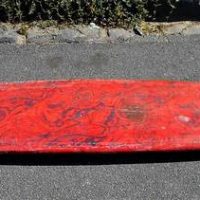 1970s 7'6 Red Surfboard single fin with round tail and psychedelic design to base - Sold for $447 - 2019