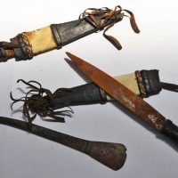 2 WW2 era pair of knives with cane binding an leather sheaths and a bronze artefact - Sold for $43 - 2019