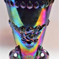 Vintage Westmoreland Carnival Glass Argonaut vase - bluegreenamethyst iridescence on three dolphin feet and raised shell design to rim and girth, appr - Sold for $137 - 2019