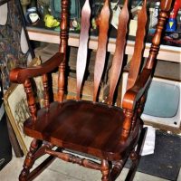 Dark wooden rocking chair - Sold for $37 - 2019
