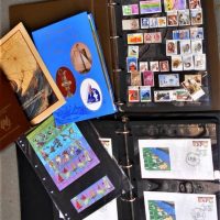 Group of stamp albums including Mint Australian stamps, Expo 88 pavilion first day covers, Americas cup issues,  1994 Australian territories - Sold for $62 - 2019