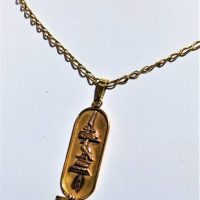 Vintage 1920s Egyptian Revival gold necklace and pendant - necklace marked 14ct pendant marked 12ct - Sold for $155 - 2019