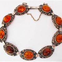 Baltic Cognac amber bracelet set in silver with Polish hallmarks - Sold for $75 - 2019