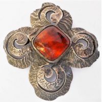 Large silver brooch with Baltic Cognac amber cabochon - Sold for $137 - 2019