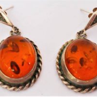 Pair of Baltic Cognac amber earrings set in silver - Sold for $93 - 2019