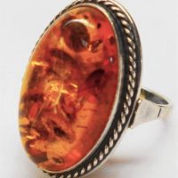 Silver ring with large Baltic Cognac amber cabochon unmarked - Sold for $161 - 2019