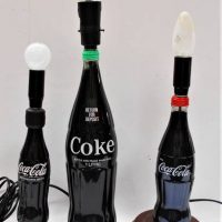 3 x 'Coke' bottle lamps - various sizes - Sold for $62 - 2019