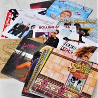 Group of LP records incl the Rolling Stones, Alice Cooper, INXS, etc - Sold for $68 - 2019