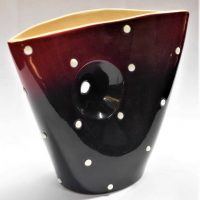 Retro Mid Century Modern DIANA Australian Pottery VASE - Unusual shape w Hole through body, raised Polka dots on a black & Maroon glazed ground, marke - Sold for $99 - 2019