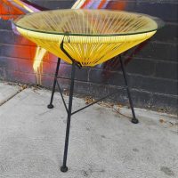 Retro yellow Acapulco side table with glass top - Sold for $62 - 2019