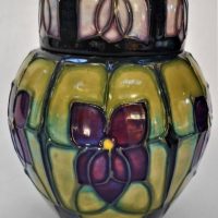1990s Moorcroft Pottery lidded ginger jar  in the Sally Tuffin violet design - impressed marks to base, approx  11cm H - Sold for $137 - 2019