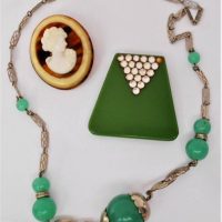 3 x pces Vintage costume jewellery - Art Deco green & diamante dress clip, German silver metal necklace with green stones & celluloid faux tortoiseshe - Sold for $124 - 2019