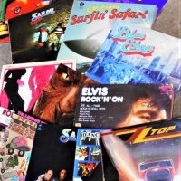 Group of LP records including The Rolling Stones, Elvis, Kiss,  ZZ Top Etc - Sold for $43 - 2019