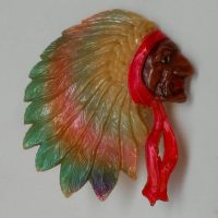 1930s 'Indian Chief' head celluloid brooch - Sold for $62 - 2019