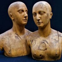 2 x c1930's carved wooden busts - male and female, approx 46 cm H - Sold for $1211 - 2019