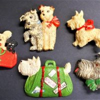 5 x 1930s celluloid and plastic comical 'Scotty dog' brooches - Sold for $149 - 2019