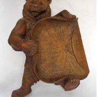 Carved Black Forest bear timber tray with glass eyes - Sold for $236 - 2019