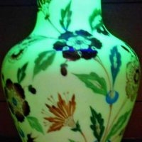 Victorian, German Krystallglasfabrik Freiherr von Poschinger cased uranium glass vase with enamel hand painted flowers - marked PK to base, approx 23c - Sold for $75 - 2019