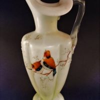 Victorian cased uranium glass jug with hand painted birds on a bough - approx 23cm H ( minor damage sighted) - Sold for $35 - 2019