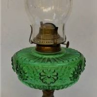 c1880s oil lamp on pierced cast iron base with pressed green glass font and regd number - Sold for $62 - 2019