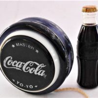 2 x vintage Coca-Cola advertising merchandise incl Coke yo-yo and figural lighter - Sold for $68 - 2019