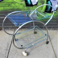 Art Deco Glass topped chrome auto trolley - Sold for $106 - 2019