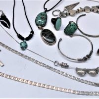 Box lot mainly 70s silver jewellery - turq Pendants, rings, Celtic cross, chains, feather pendant, bangles, chunky bracelet etc - Sold for $56 - 2019