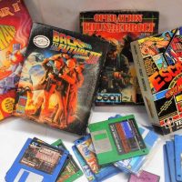 Group of Boxed and loose Atari computer games including Dragons lair II and Escape from the planet of the robot monsters etc - Sold for $50 - 2019