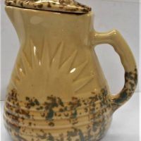 1930s ceramic electric jug kettle with Sun pattern and green sponge glaze - Sold for $43 - 2019